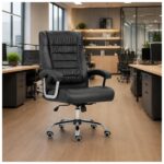 Cadeira Presidente Luxo com molas ensacadas em escritório moderno com mesa de trabalho.